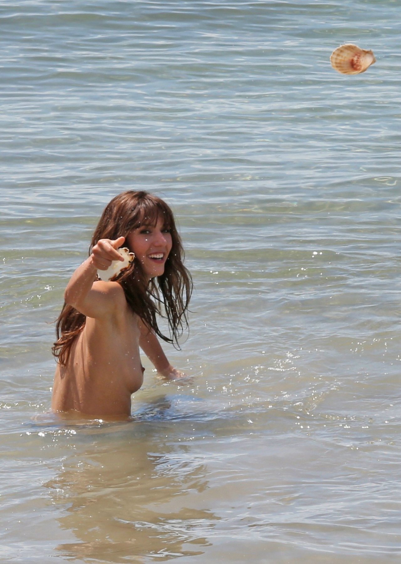 toplessbeachcelebs:  Doria Tillier (French TV Star) topless in Cannes (May 2014)