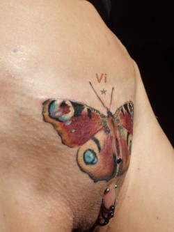 Pierced Pussy With A Butterfly Tattoo.