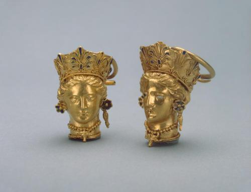theancientwayoflife:~ Pair of Earrings with Pendants in the Shape of a Female Head.Place of origin: 