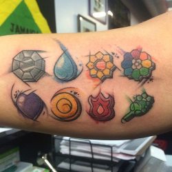 gamerink:      Watercolor Pokemon badges tattoo done by @tattoosbyliat.    