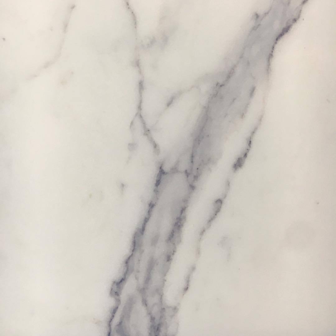 Just a nice slab of marble on the wall on the way to the garage. (at Washington, District of Columbia)