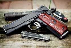 gunsknivesgear:  Nighthawk 1911. I trust my life to my Glocks.  But I know that there is no pistol as beautiful as a mastercrafted 1911.