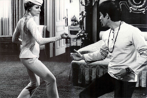 giablo69:  Bruce Lee working with Sharon Tate on the set of the Dean Martin’s Matt