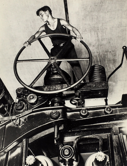 sovietpostcards: Komsomol young man at the wheel of a paper making machine. Photo by Arkady Shaikhet