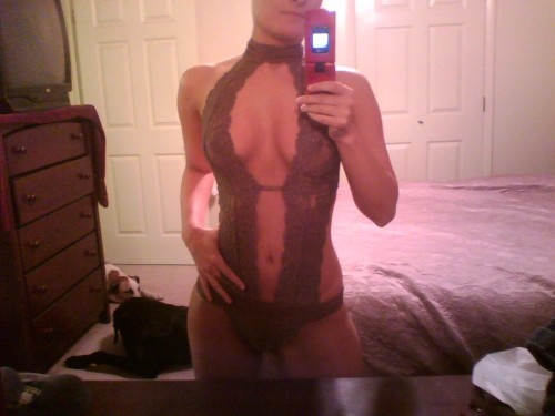 mymarinemindpart2:  An Air Force girl posing (There is an air force poster in the mirror shot) 