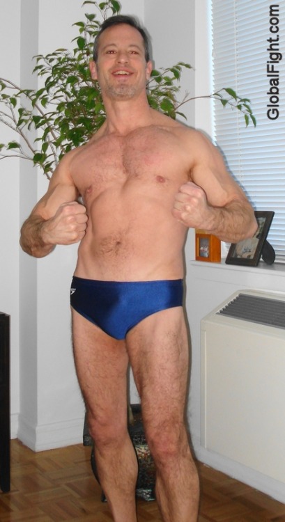 wrestlerswrestlingphotos:  speedos muscle dude flexing