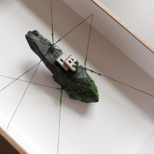 archatlas:  Miniature Houses on Cork Cliffs Float Inside Handmade Wooden Frames by Rosa de Jong  Designer Rosa de Jong produces micro homes that are built into the side of tiny cliffs constructed out of cork. Her miniature environments are covered in