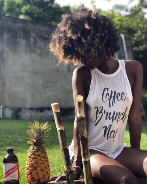 islandnaturals: Island vibes with @migdaniabanhan   #pineapple #sugarcane #redstripe #curlyfro   (at