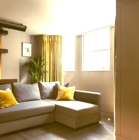 Basement Lookout In London Inspiration For A Large Contemporary Look-out Medium Tone Wood Floor And Gray