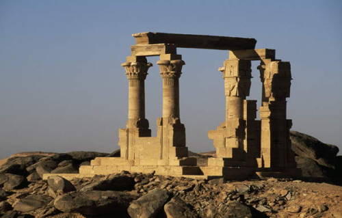 Kiosk of QertassiA tiny Roman kiosk with four slender papyrus columns inside, two Hathor columns at 