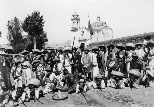 georgy-konstantinovich-zhukov:A group of townspeople, possibly a local militia force, pose during th