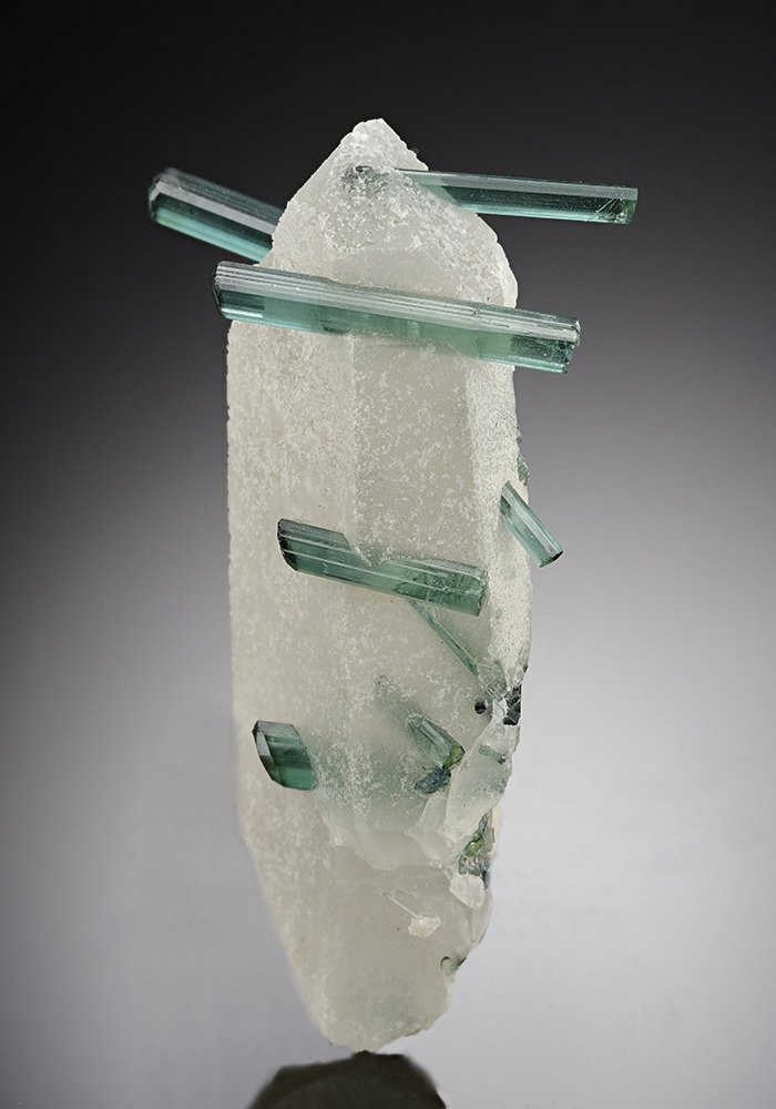 hematitehearts:  White Quartz with Penetrating Blue Green TourmalineLocality:  Manoel