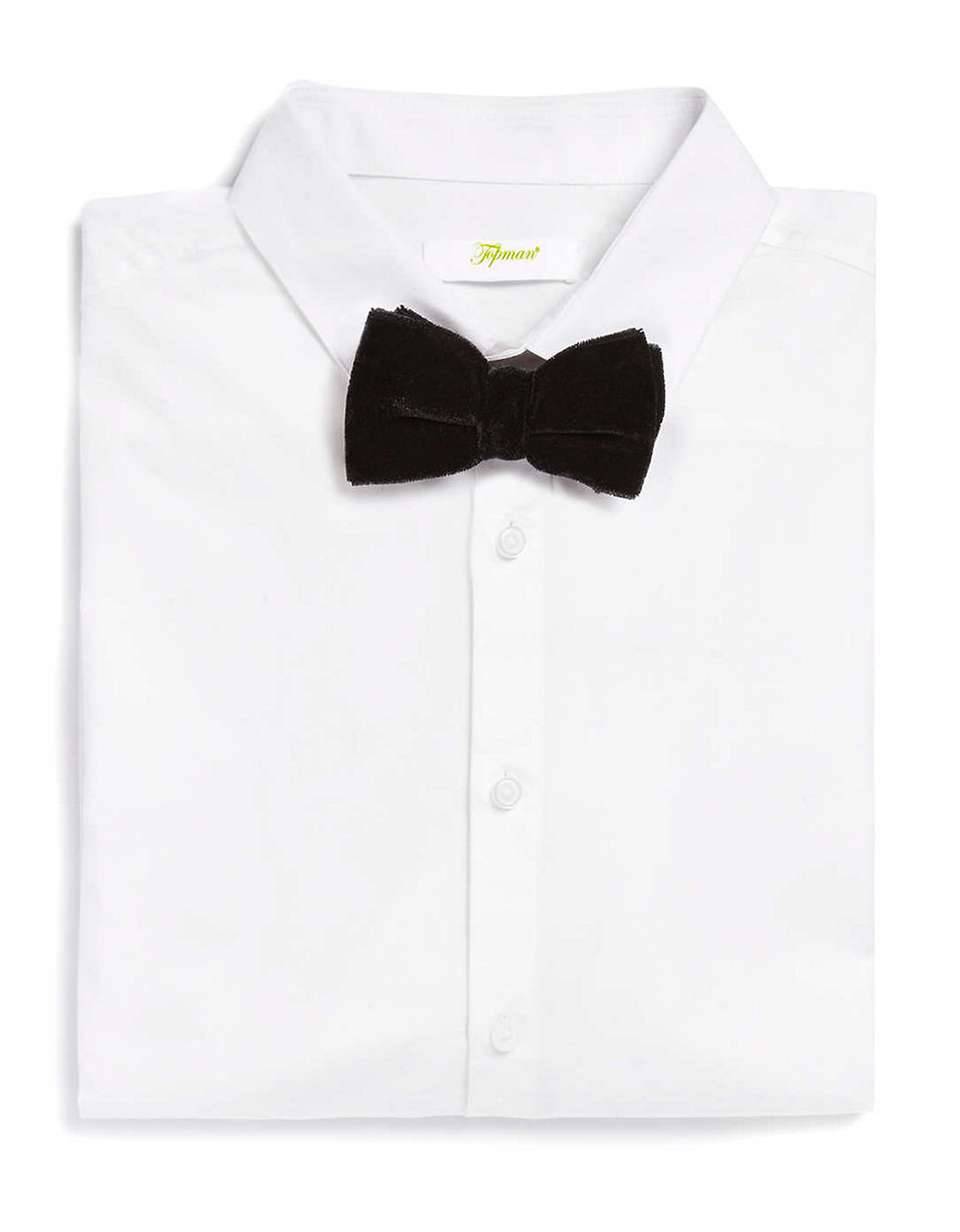 never-under-dressed:  Black Velvet Bow TieSearch for more Bowties by Topman on Wantering.