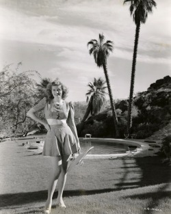 midcenturymodernfreak:  (retrogirly)  Here’s a young Lucille Ball in 1939 at the same “mystery&ldquo; pool we posted a few days ago. It turns out it’s at the iconic Tennis Club oval pool in South Palm Springs behind Spencer’s Restaurant. The