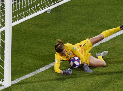 Alyssa Naeher saves a penalty during the match vs. England