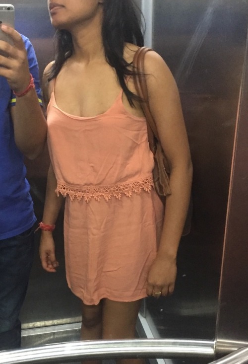 newcplpune:  New series of pics - Amanda dressed in the shortest and deepest dress u can find on a married woman.  She went to the mall and posed at a bakery shop where you can see her nipple pasties showing ( yes she was bra less and crotch less too