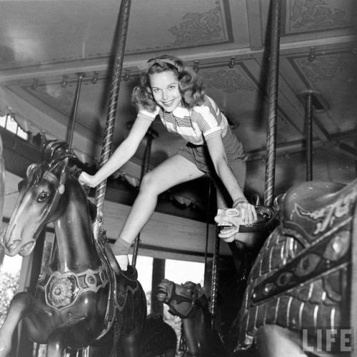 Not how you’re supposed to ride the carousel(Bob Landry. 1942)