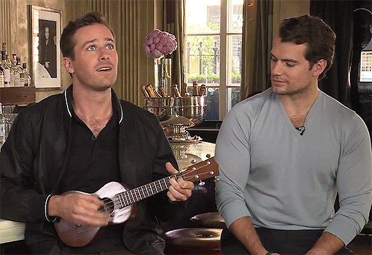 leupagus:thetriofromuncle:Armie Hammer playing the ukulele in an interviewAre we sure that’s not jus
