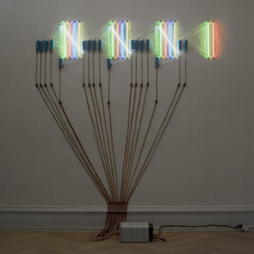 lafilleblanc:  Uffe Holm “The number of days from seeing a work by On Kawara to seeing a work by Dan Flavin”, 2006Coloured light tubes, electrical wires, power supply, 2x2 m on wall 