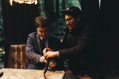 Directors Dan Kwanand Daniel Scheinert with Paul Dano and Daniel Radcliffe while filming Swiss Army 