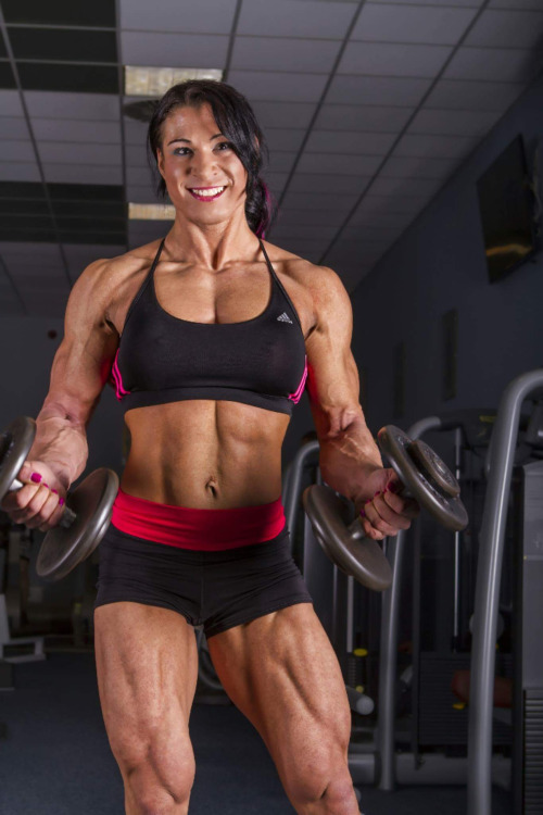 femalemuscletalk:  Wanna see me juggle these? Better step back a bit.  http://bit.ly/10U4NH