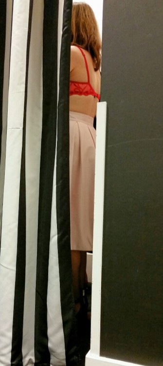 She is such a tease, always leaving a gap in the changing room curtains!