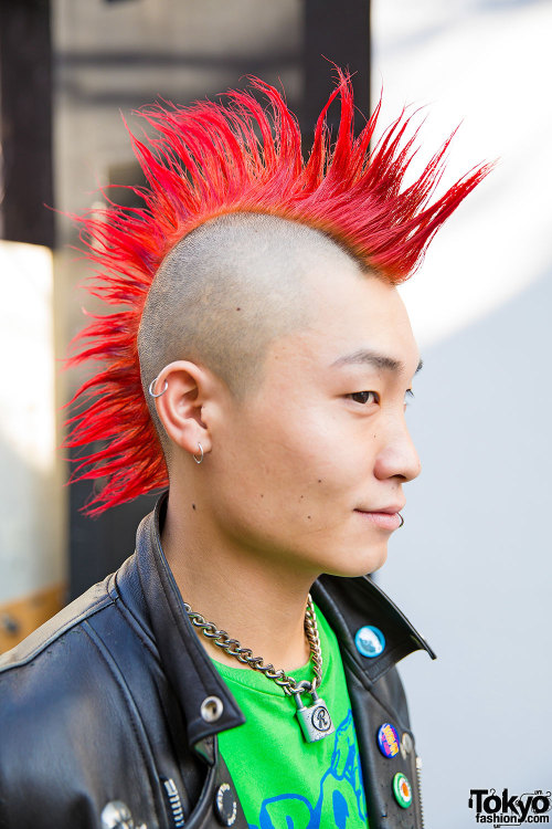 22-year-old Nobuyuki on the street in Harajuku with a red mohawk, leather jacket, zipper jeans from 