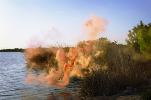 asylum-art:   Irby Pace’s Color Explosions    Texas-based artist Irby Pace‘s works can be described as haunting and ethereal. In his series “Idle Voids,” Pace uses various outdoor spaces and adds his own “pop” of color to each environment