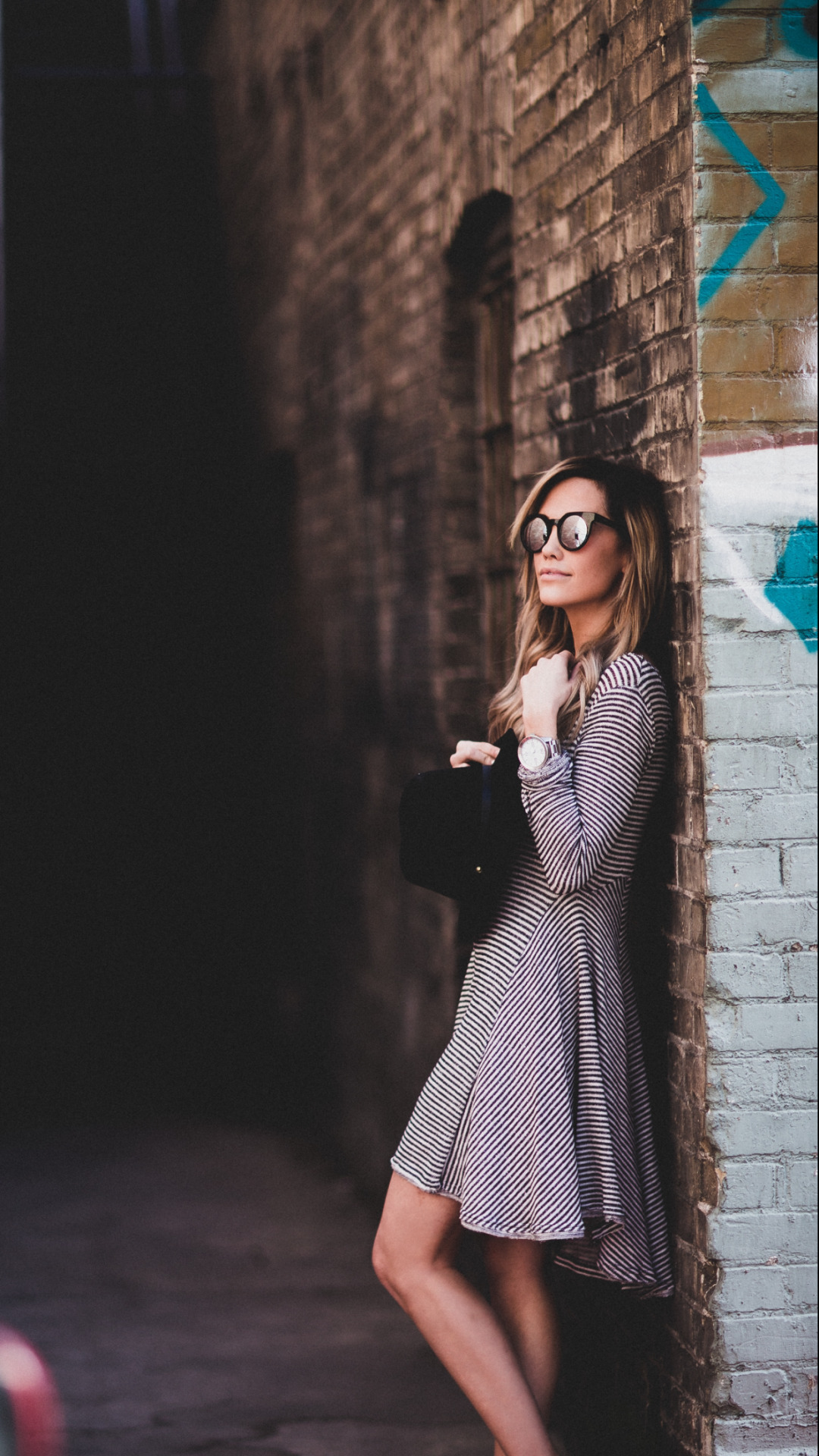 justthedesign:Striped Outfit Ideas: Megan Anderson is wearing a long sleeved pinstripe