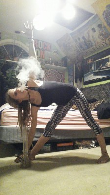 psychedelic-psychoo:  My triangle pose with a twist and a toke ✌💨