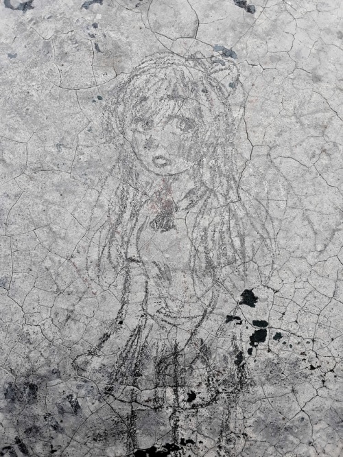 Some Of Us Just Doodled On Cement.
