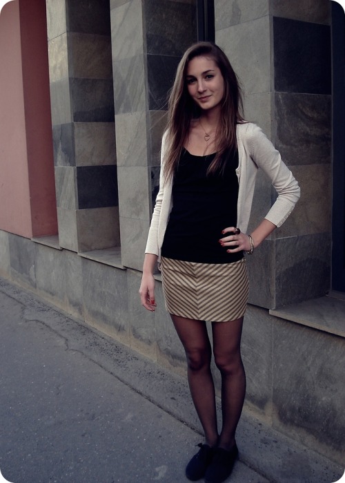 tightsobsession:Cute girl in patterned skirt and sheer nylons.Tights week starts November 3rd!