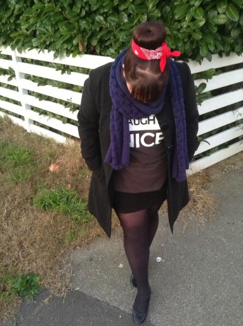 she lowered her head for inspection. Showing off the perfectly formed Bun.decorated with a colorful 