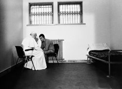 historicaltimes:  St. Pope John Paul II meets with Mehmet Agca, the man who tried to assassinate him, in a Roman prison cell, 1983. via reddit 