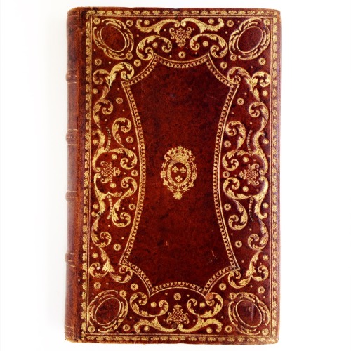 Ornate gilt calf binding with what appears to be the royal coat of arms of Louis XV in the centre - 