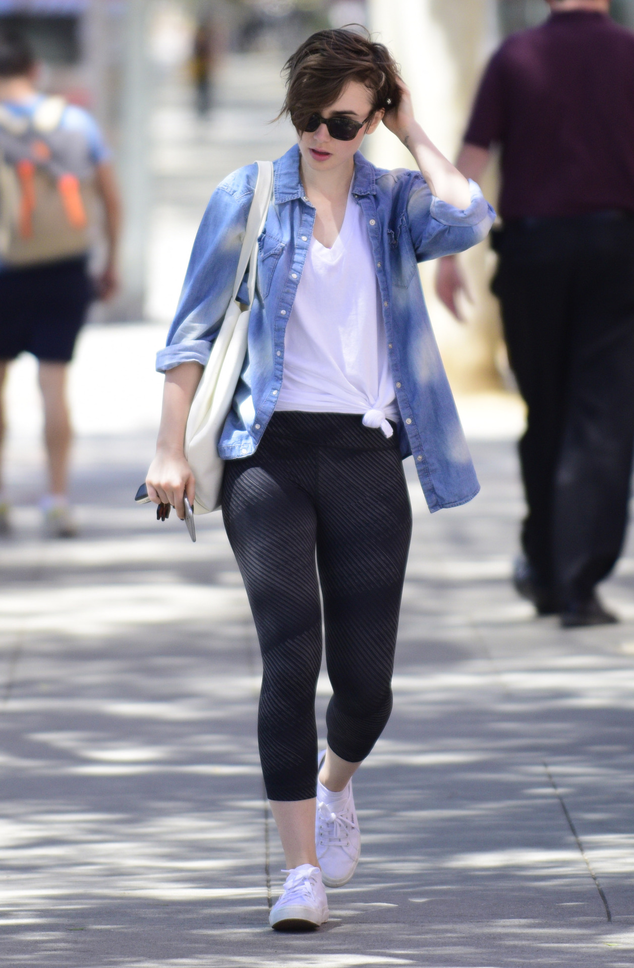 lilycollinsnews: Lily Collins - Leaves Body Pilates in West Hollywood 04/29/2015