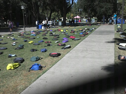 kimlundgren: neilsenad: My college did this thing today where they laid out the backpacks of studen