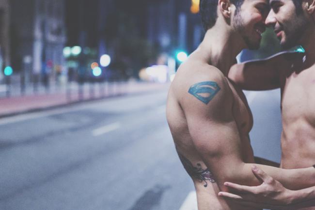 nakeddamienboy:  Brazilian Gay Couple Strips Naked To Protest Homophobia Some sign