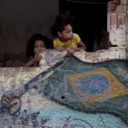 crime-life:Girls watch a demonstration calling