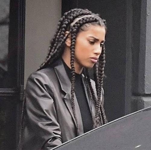 The braids, the leather blazer *chef’s kiss*