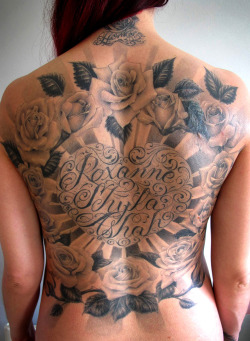 thievinggenius:  Tattoo done by Ben Leland-Grillo.  Love the roses