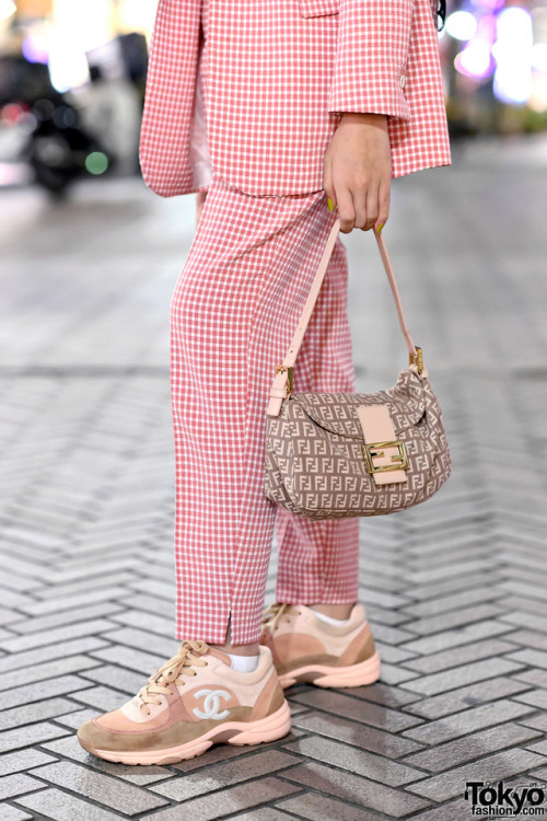 tokyo-fashion:  Amelia Elle, a hijabi fashion blogger from Indonesia, on the street in Shibuya, Tokyo wearing a pink check Zara suit, Fendi logo bag, and pink Chanel sneakers. Full Look