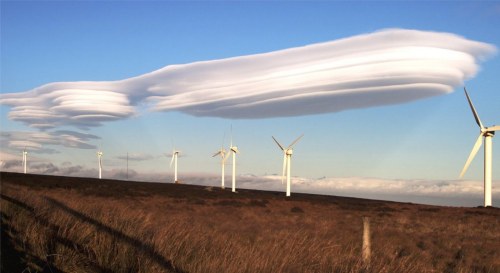 wtfobserver:  Wikipedia: Lenticular clouds (Altocumulus lenticularis) are stationary lens-shaped clouds that form at high altitudes, normally in perpendicular alignment to the wind direction. Due to their shape, they have been offered as an explanation