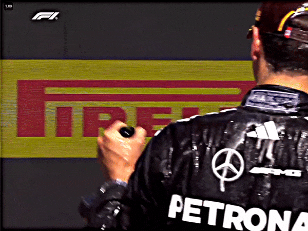 Max Spraying The Champagne On George 