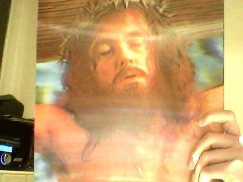 throbinhood:  my most prized possession is a holographic image of jesus that i have  where he blinks when you move him  and if you angle it right he’ll wink  oohhhh jesus you saucy devil you 