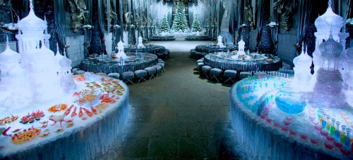 Hors d’oeurves and colorful beverages are laid out beneath towering ice castles as the Great Hall of