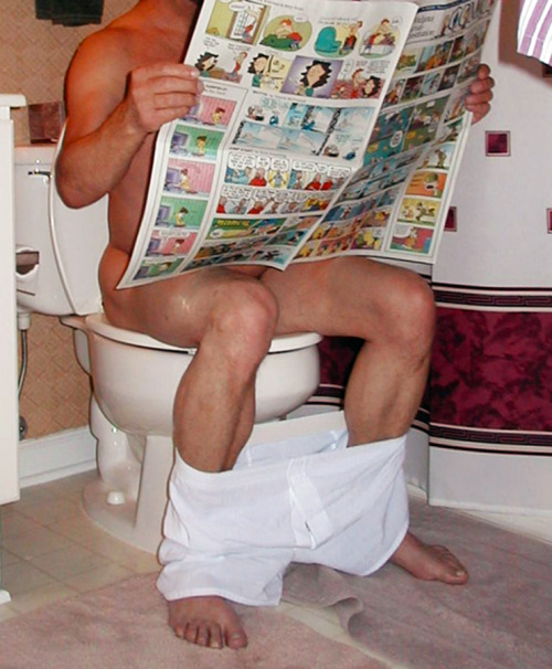 radioactivepolitics:  Men taking a shit and trying to do some reading in the process.  Why is t