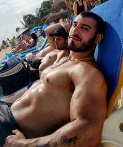 12johnnyboy:  stratisxx:  Sexy arab on the beach. This guy was so hot but he was there with his two bottom boyfriends. Apparently they are in a threesome relationship.  This guy is a king.  Waking up every morning to two boys fighting over his cock. If