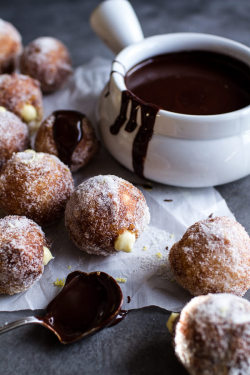 sweetoothgirl:  Vanilla Cream Filled Cabernet Hot Chocolate Snowball Doughnuts 