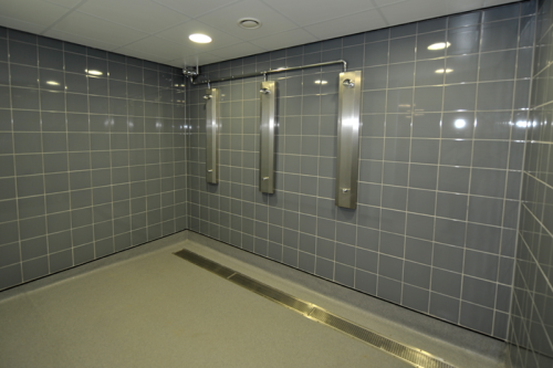Changing room and showers at Irlam and Cadishead Leisure Centre in Manchester, UK.The centre opened 
